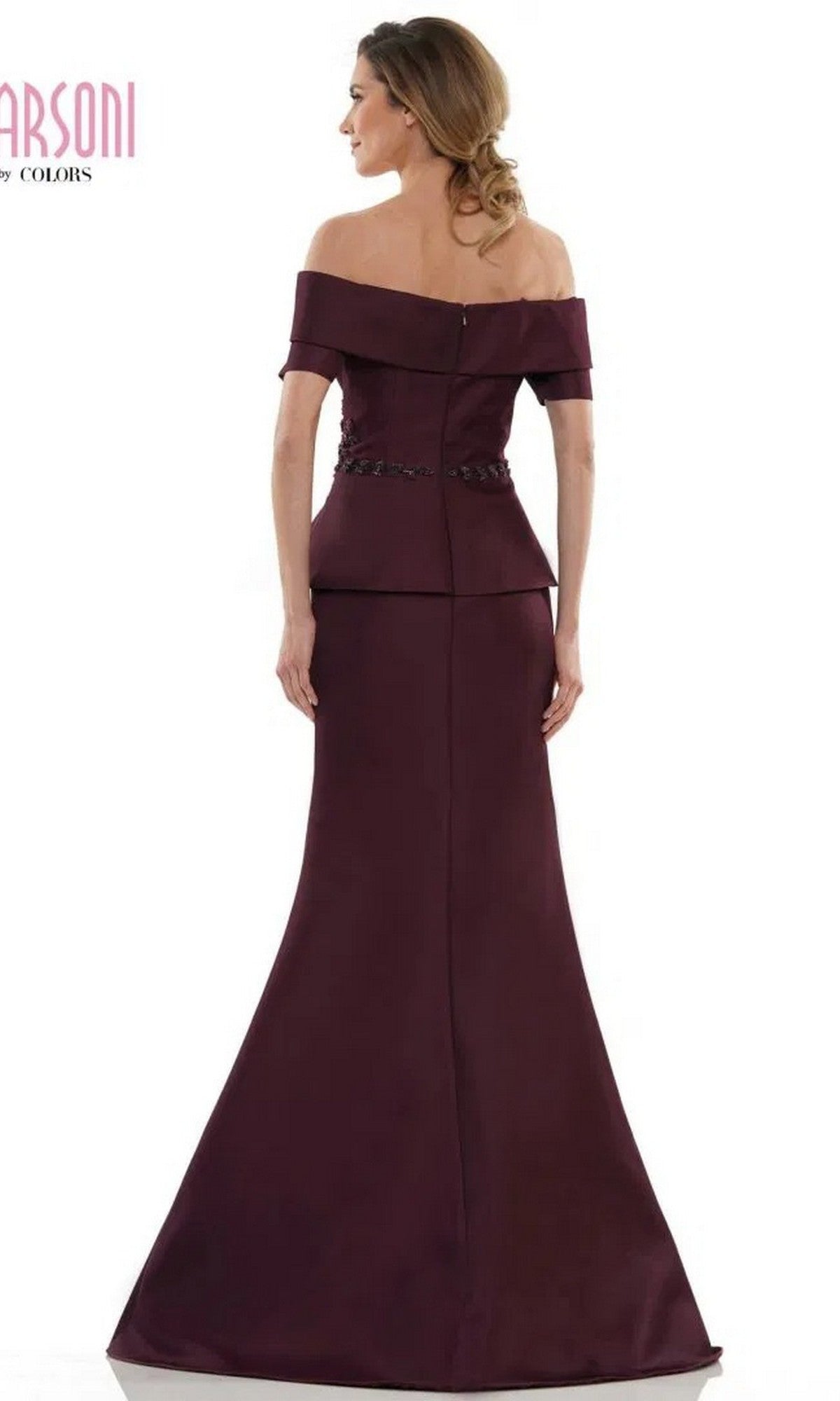 Woman shown from the back wearing the Marsoni MV1144 long formal dress, an off-the-shoulder, floor-length gown in dark burgundy with a fitted waist and flared skirt.